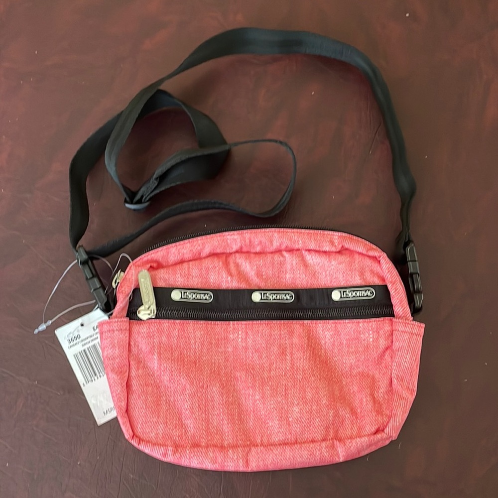 LeSportsac Candace Convertible Crossbody Dahlia Denim in pink color. NWT